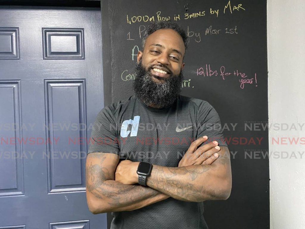 Tobias Ottley shows some of his client’s 2020 goals on a chalkboard wall in the gym to serve as inspiration during sessions. - 