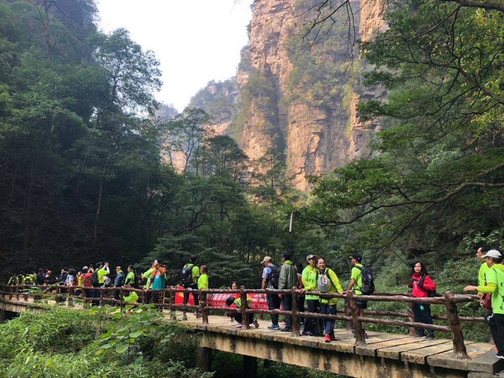 Hashers make their way along a train in China.  - 