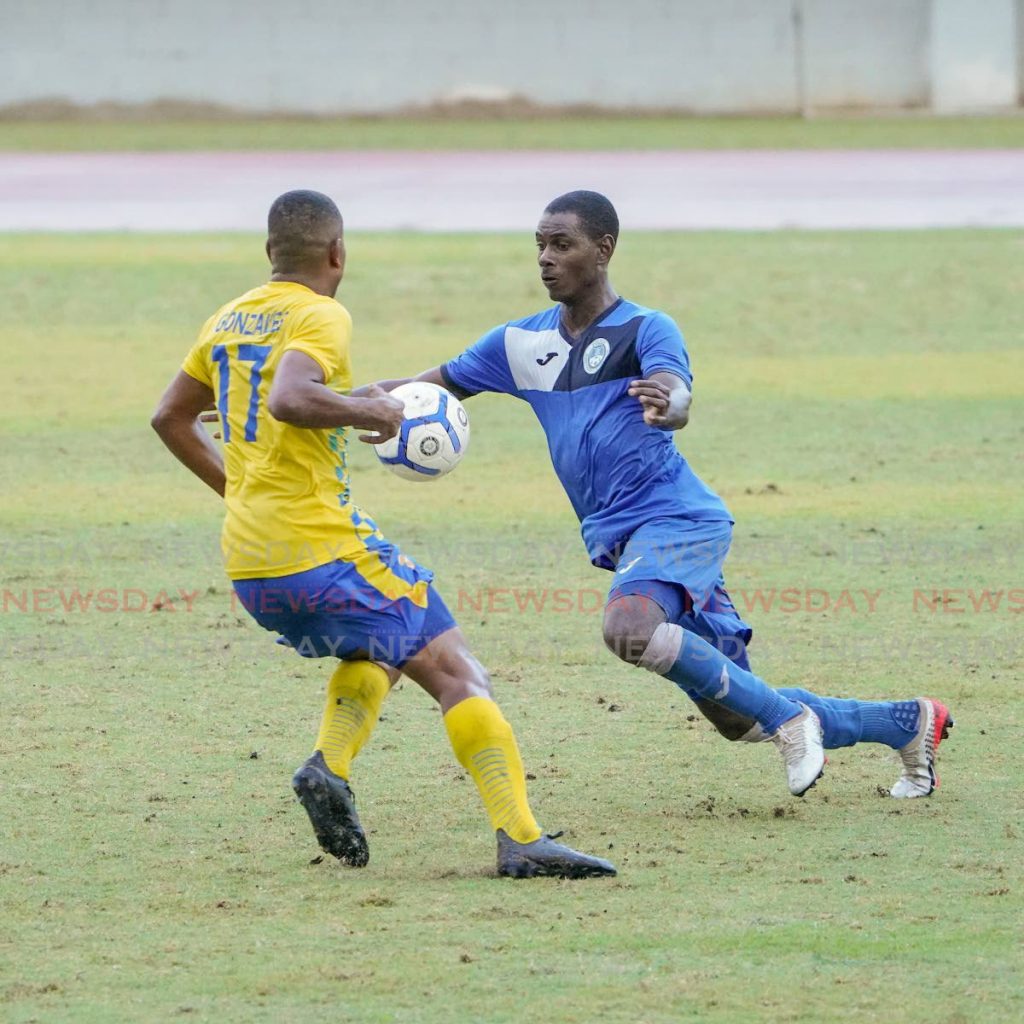 Action in the TT Pro League match between Police FC and Defence Force FC,at Larry Gomes Stadium,Malabar, Arima, on Sunday. The match 
ended 0-0. - Daniel Prentice/CA-images