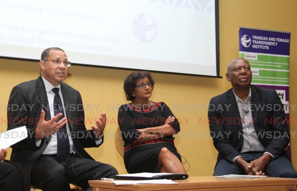 Former Minister of Finance, Mariano Browne makes a point during a panel discussion at the 2019 Corruption Perception Index launch on Thursday.  With him are Sunity Maharaj, director of the Lloyd Best Institute, and political analyst Dr Winford James.  PHOTO BY AYANNA KINSALE - AYANNA KINSALE