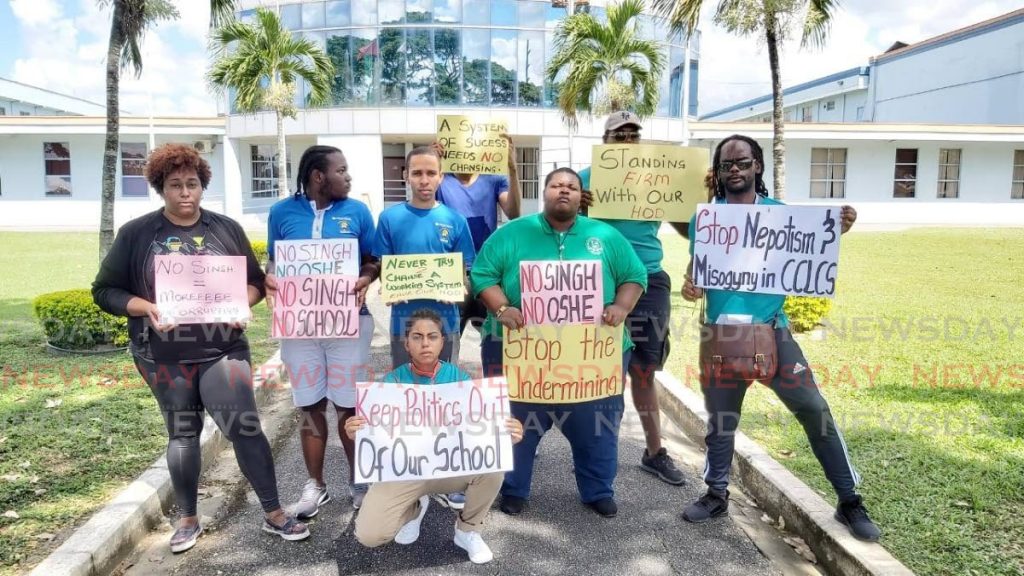 Students of Cipriani Labour College in Valsayn, protest on Friday in support of Dr Judy Singh who is head of the college’s department of occupational safety, health and environment.  - 