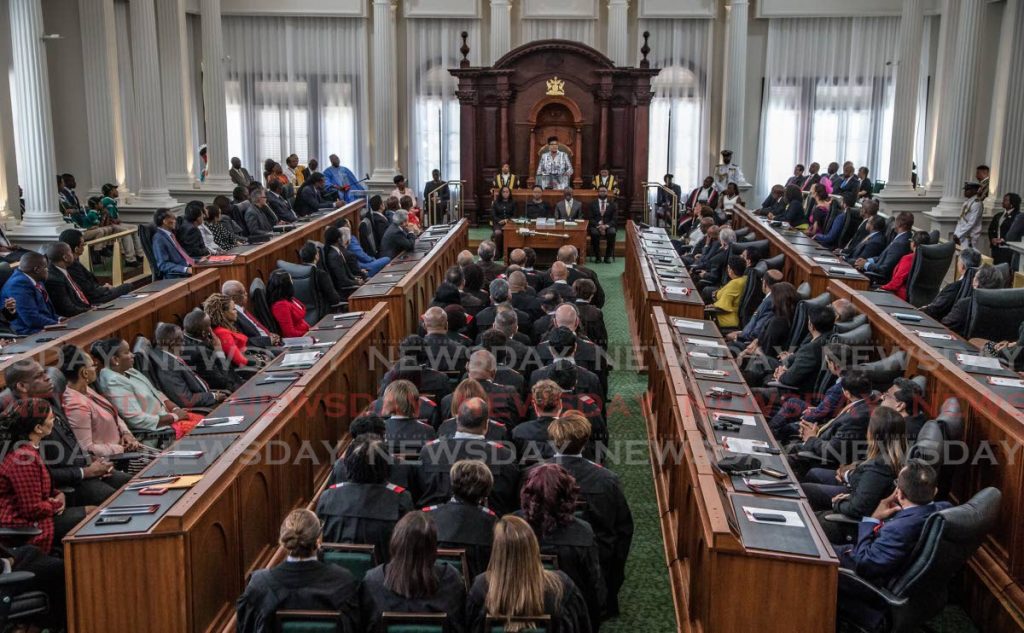 LISTEN UP: President Paula-Mae Weekes addresses MPs, senators and judges at the re-opening of the Red House on Friday.  PHOTO BY JEFF K MAYERS - Jeff Mayers