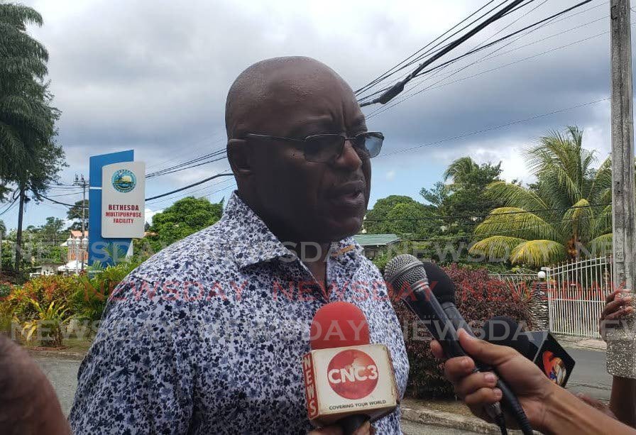 Defeated PNM political leadership candidate Kelvin Charles speaks to the media after voting at the Bethesda Multipurpose Facility on Sunday. PHOTO BY KINNESHA GEORGE-HARRY  - KINNESHA GEORGE-HARRY 