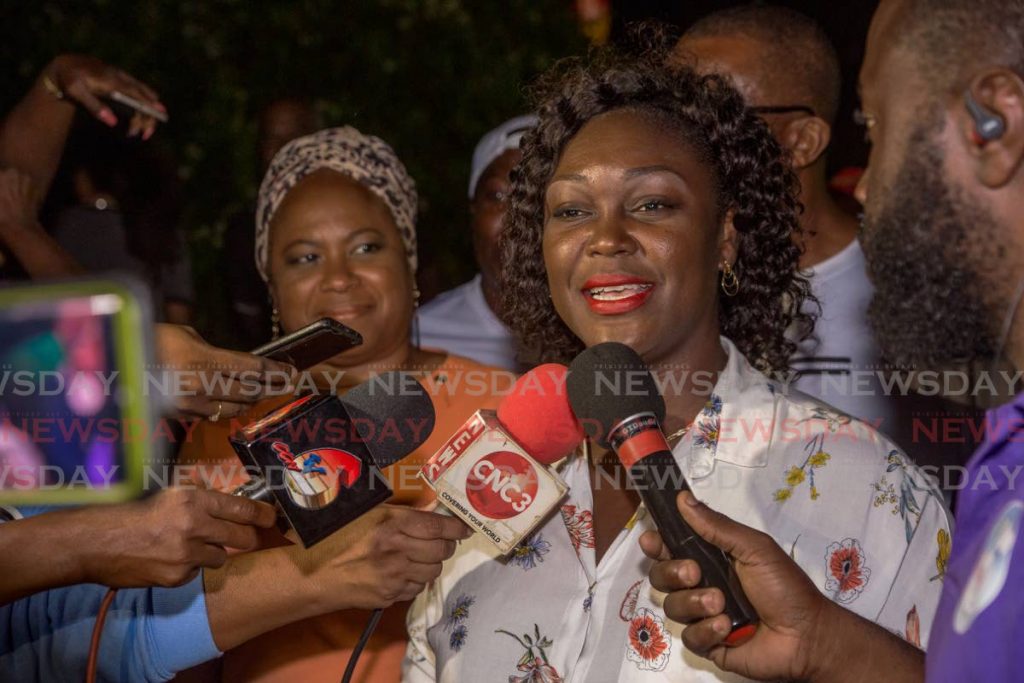 An elated Tracy Davidson-Celestine talks to the media after being elected the PNM Tobago Council's first political leader on Sunday in a runoff against Kelvin Charles. PHOTO BY DAVID REID  - DAVID REID