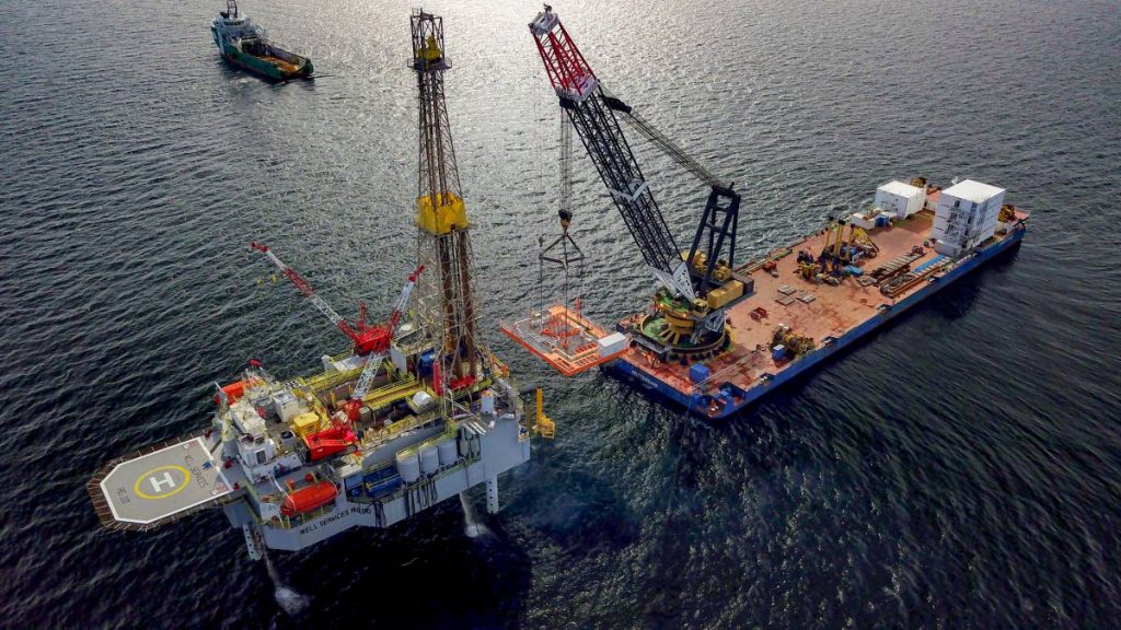 The installation of DeNovo’s Iguana platform with well services Rig 110 and heavy lift barge. Photo courtesy DeNovo