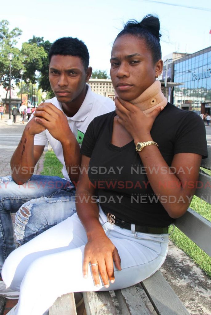 From left, Jairo Fontt, 22, and Yuliannys Pérez, 19, speak with Newsday at Independence Square, Port of Spain, on Wednesday. - AYANNA KINSALE