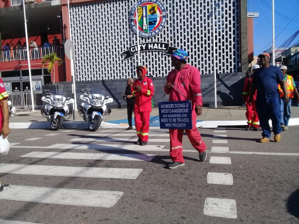 Members of the Amalgamated Workers Union (AWU) march near City Hall, Port of Spain. Photo- Shane Superville