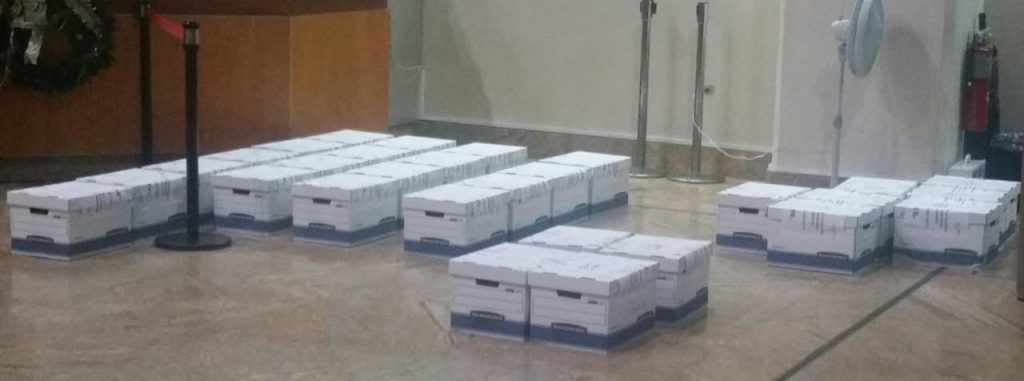 SEIZED: Boxes said to contain $29m in paper $100 notes at a national security facility. The money was brought to the Central Bank on December 31, 2019 by pastor Vinworth Dayal who wanted to exchange it for the new polymer notes which are now legal tender.  