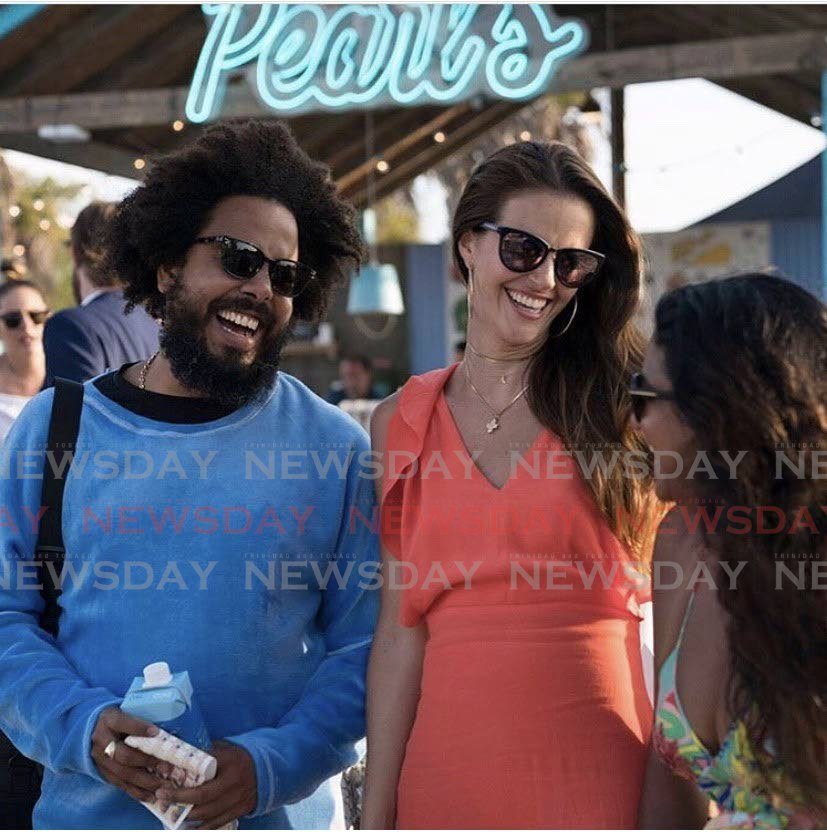 DJ and music producer Jillionaire (Christopher Leacock); Fallon Seymour, owner of Pearl’s restaurant; and handbag designer Ria Ramkissoon, all TT-born, enjoying endless summer in Pearl’s backyard. Photo taken from Pearl’s Instagram page - 