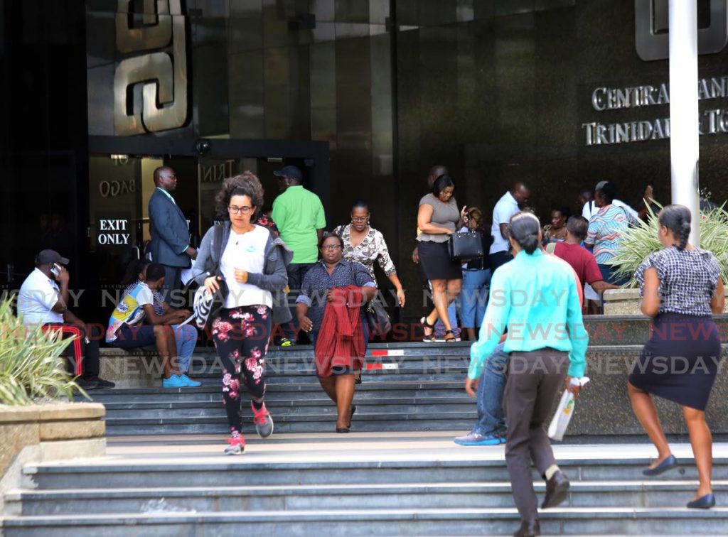 Members of the public at the Central Bank, Port of Spain. - SUREASH CHOLAI