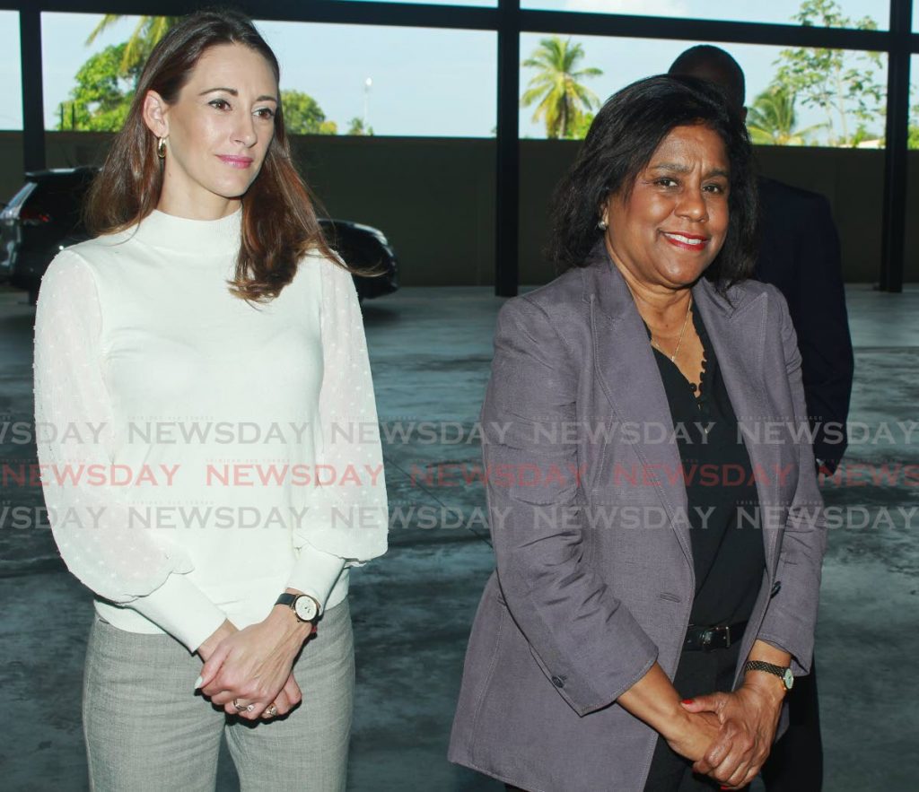 TT Manufacturers Association president Franka Costelloe and Trade Minister Paula Gopee-Scoon at New Wave Marketing in Couva on Tuesday.   - CHEQUANA WHEELER