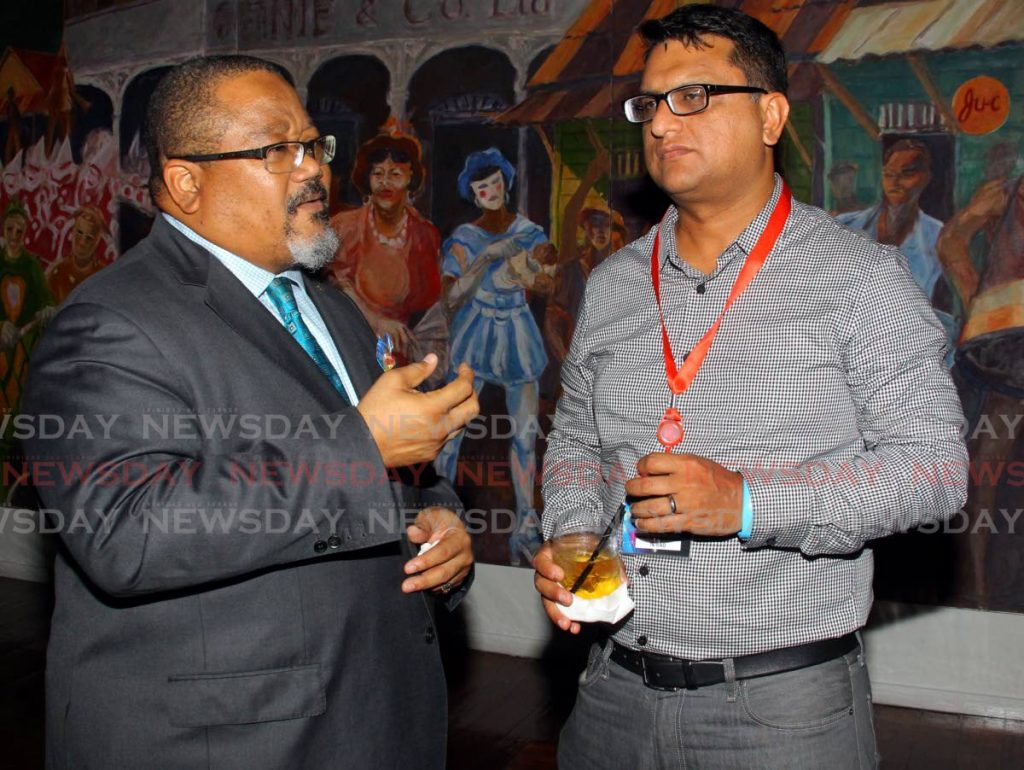 
Republic Bank executive director Derwin Howell, left, and Amcham TT CEO Nirad Tewarie at the launch of FinTech Association at the National Museum and Art Gallery, Port of Spain on February 5. - ROGER JACOB