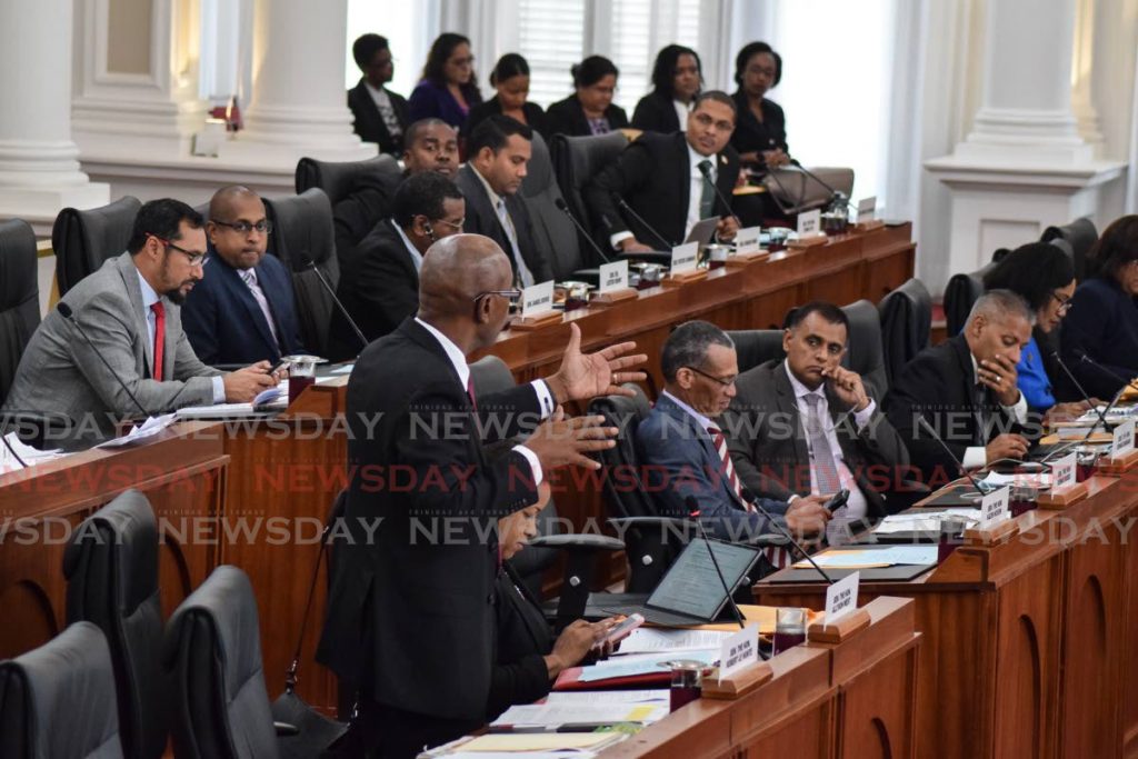 MY POINT IS: Public Utilities Minister Senator Robert Le Hunte makes a point during his contribution to debate on the Interception of Communication (Amendment) Bill, which seeks to empower the state to use communications intercepted in prison as evidence in court.  - Vidya Thurab