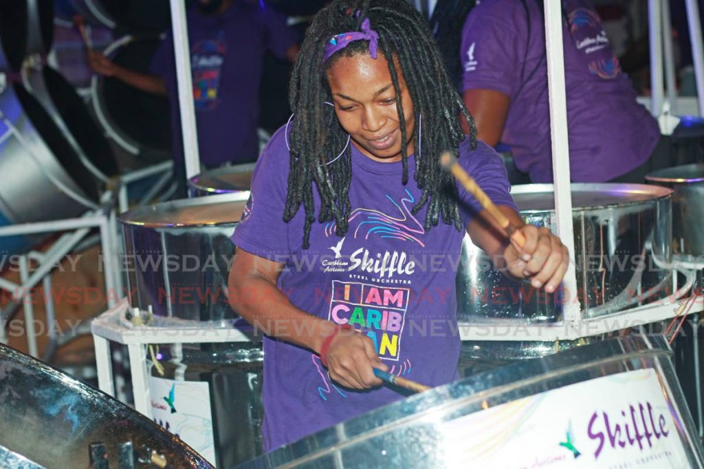 This player gets into the music at CAL's sponsors appreciation event at Skiffle Steel Orchestra, Coffee Street, San Fernando. - CHEQUANA WHEELER