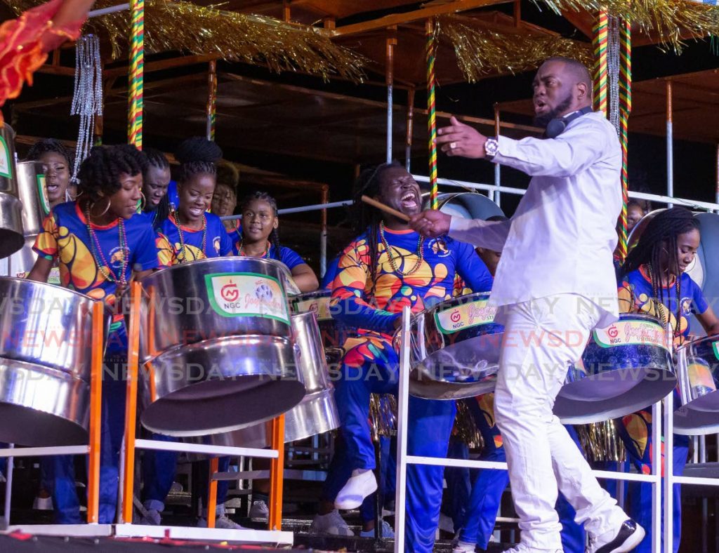 Arranger Stefon West instructs NGC Couva Joylanders players on their way to their first National Panorama title in the finals of the medium conventional bands category. - DAVID REID 