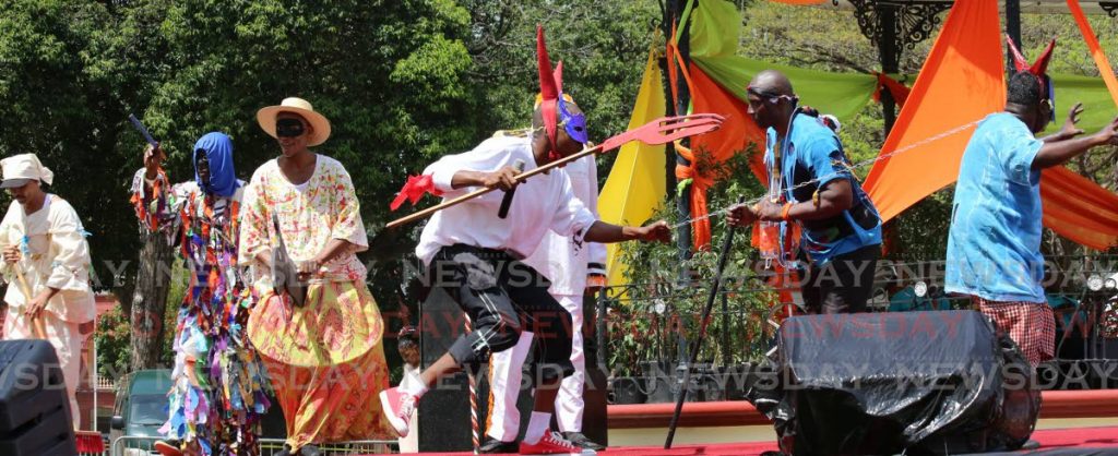 Carnival characters from the Brown Cotton Treatre group  at the Trinidad and Tobago Prisons Service Inmates Carnival Showcase at Woodford Square in Port of Spain on Wednesday.  - SUREASH CHOLAI