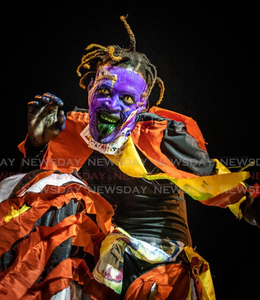 Ooops, Lets Play portrayed by Tekel Sylvan of Moko Somokow in the moko jumbie category of the NCC's Traditional Individual mas competition at Adam Smith Square, Port of Spain on Tuesday.  PHOTO BY JEFF K MAYERS - 