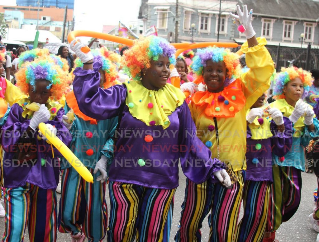 Point Fortin East Secondary School presents Fancy Clowns during the Traditional Mas Parade, Port of Spain on Friday. - Ayanna Kinsale