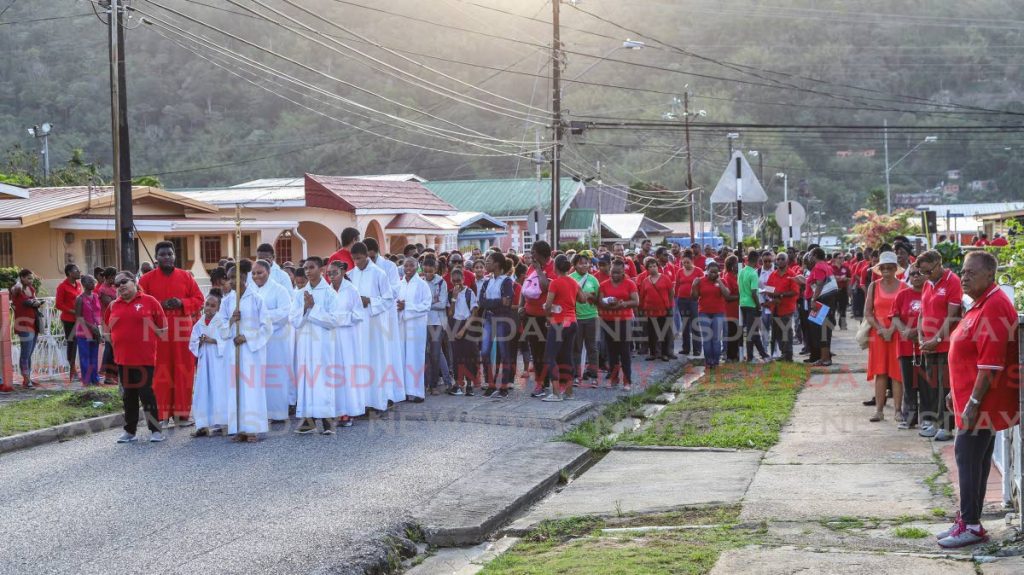 Members of the St Michael's Anglican and St John's RC churches take part in the stations of the cross in Diego Martin on April 4, 2019. Holy Week observances will be streamed online due to covid19 restrictions.  - PHOTOS BY JEFF K MAYERS