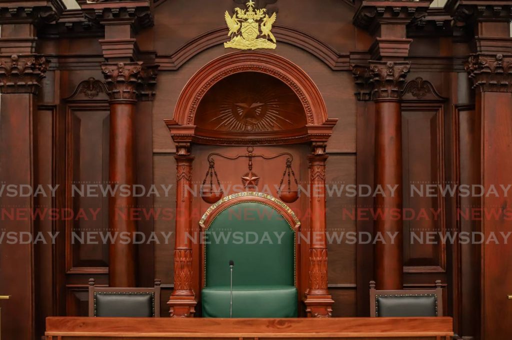 The Speaker's chair. The inscription reads: From the people of India to the people of Trinidad and Tobago.
 - JEFF K MAYERS