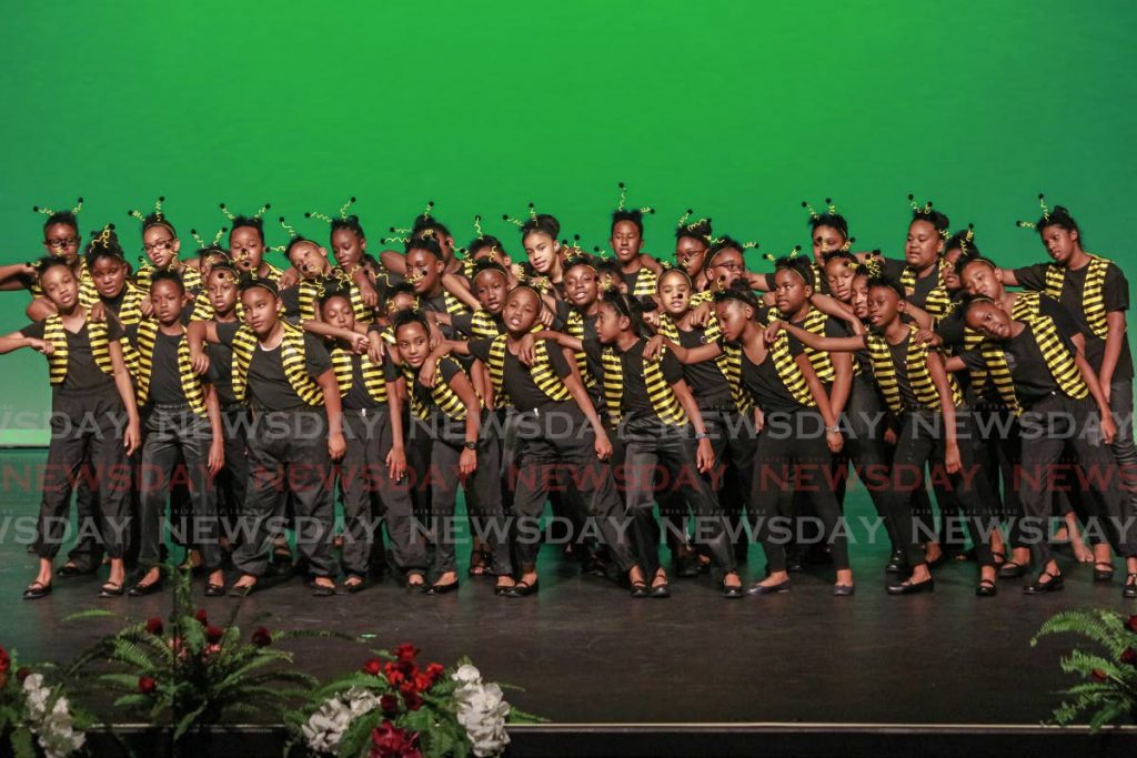 YOUNG & TALENTED: Members of the Gabrielites Chorale perform in the Junior Calypso Chorale at the 33rd annual Music Festival at the Naparima Bowl in San Fernando. - CHEQUANA WHEELER