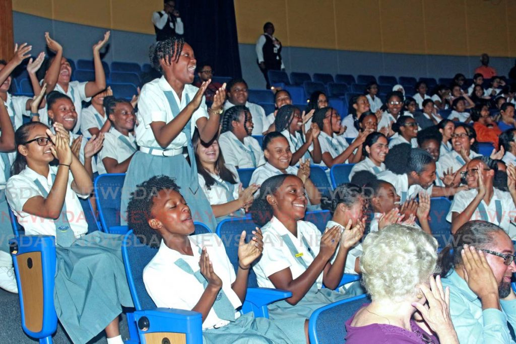 JUBILANT: Students cheer on performers at the Naparima Bowl.  - CHEQUANA WHEELER
