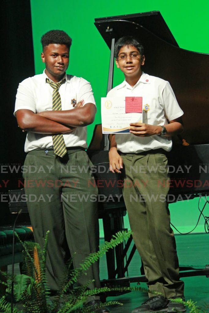 WINNERS: Jodel Stoute and Wiraaj Annamunthodo, of Presentation College, who won big on Thursday in the Music Festival at Naparima Bowl. PHOTO BY CHEQUANA WHEELER - CHEQUANA WHEELER
