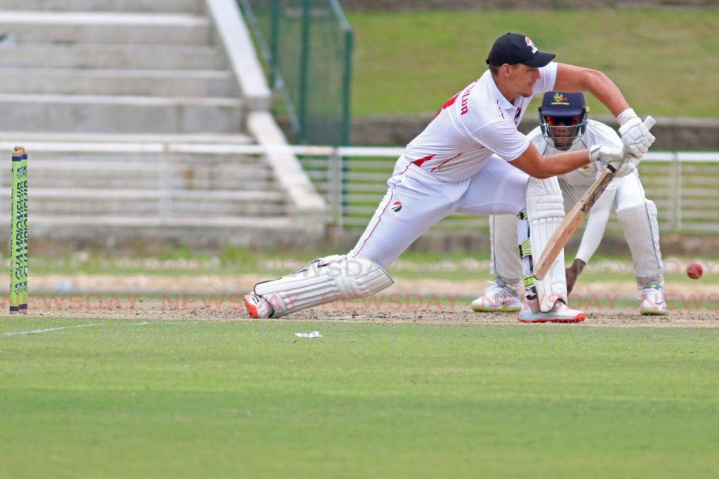 TT Red Force batsman Joshua Da Silva plays a forward defensive stroke, to a delivery from Jomel Warrican, during the first day on Thursday. PHOTO BY MARVIN HAMILTON. - Marvin Hamilton