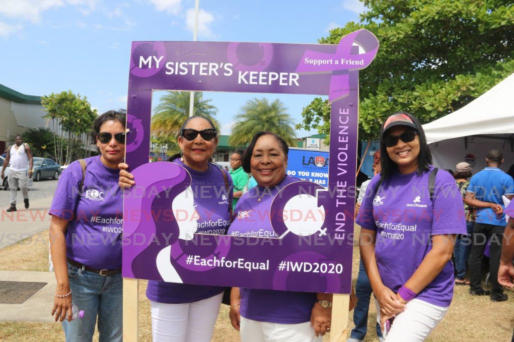 (Left to right) Equal Opportunities Commission research officer Annmarie Price, chairman Lynette Seebaran-Suite, vice chairman Dr Beverly Beckles and CEO Devanty Maraj Ramdeen at the My Sister's Keeper rally, Centre City Mall, Chaguanas on Friday. PHOTOS BY MARVIN HAMILTON - 