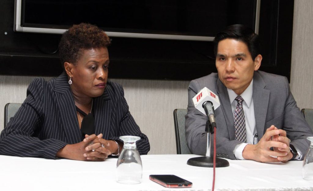 Endocrinology specialists Dr La Vern A Scott and Dr Chih Hao Chen Ku speak at the launch of the new diabetes drug, Toujeo at Hilton Trinidad, Port of Spain on Saturday. PHOTO BY ANGELO MARCELLE - 