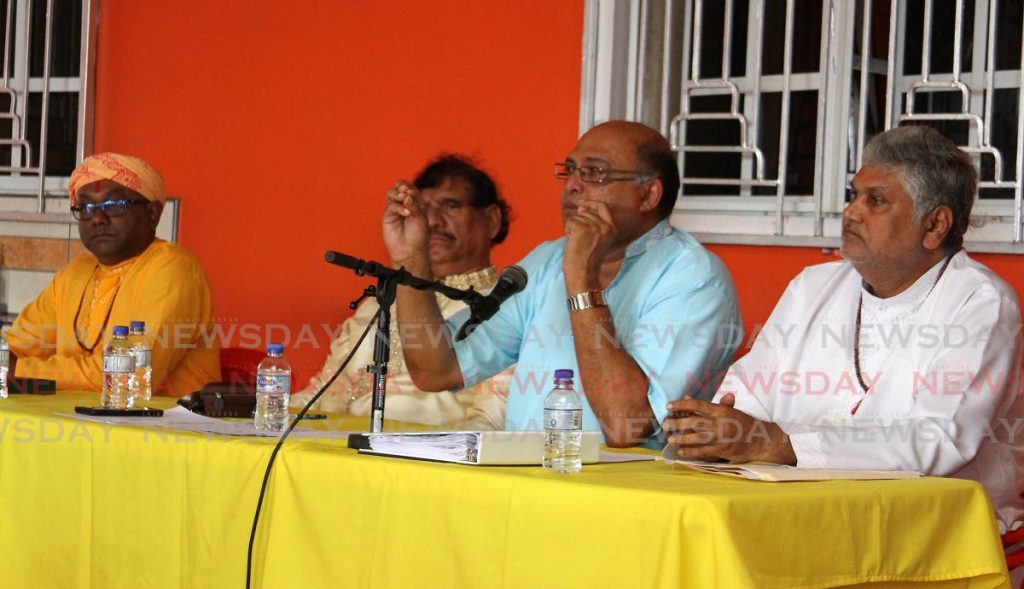 SPEAK OUT: Attorney Vashist Maharaj, who represens six pundits who have filed a pre-action protocol letter against the Maha Sabha leardeship, speaks at a press conference on Sunday in Charlieville. 
 - Angelo Marcelle