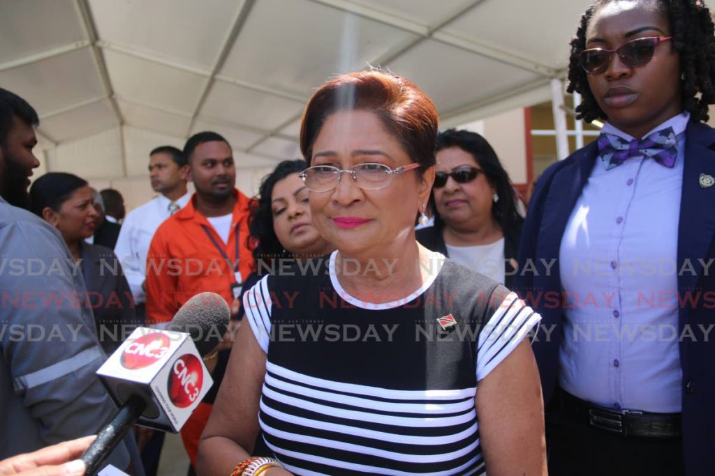 Opposition leader Kamla Persad-Bissessar speaks to media at the opening of Penal Fire Station on Tuesday morning. - Marvin Hamilton