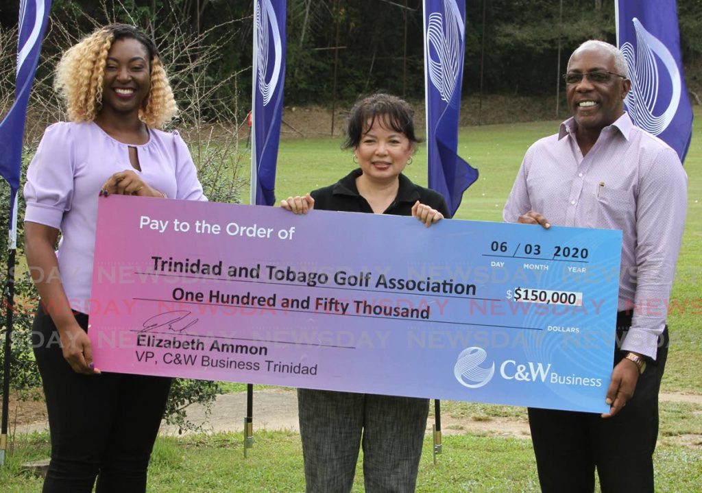 Senior manager of Cable and Wireless business Elizabeth Ammon (C) presents a cheque to director of the TT Golf Association (TTGA) Afia Alexander-Henry (C) and vice president of the TTGA Glenn Redhead at St. Andrews golf Club on Tuesday.  - Ayanna Kinsale