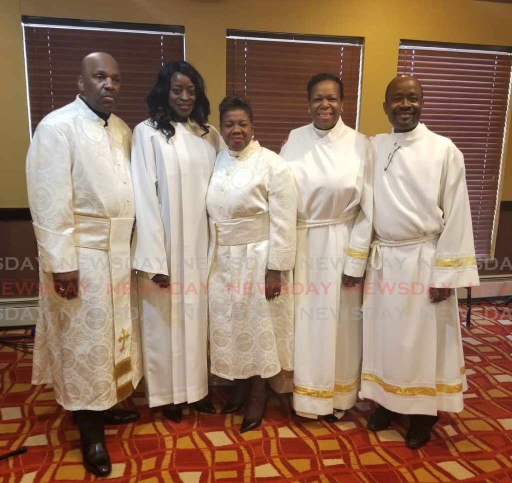 Sen Donna Cox, Minister of Communications, second from left, at her ordination at the Prophetic Church of Antioch, Inc, Hollis, New York, last year.  - 