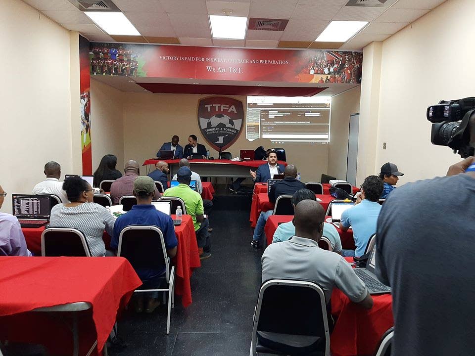 Concacaf’s Cristhian Tonelli interacts with club representatives during the workshop last Wednesday, at the Ato Boldon Stadium media room. - via TTFA Media