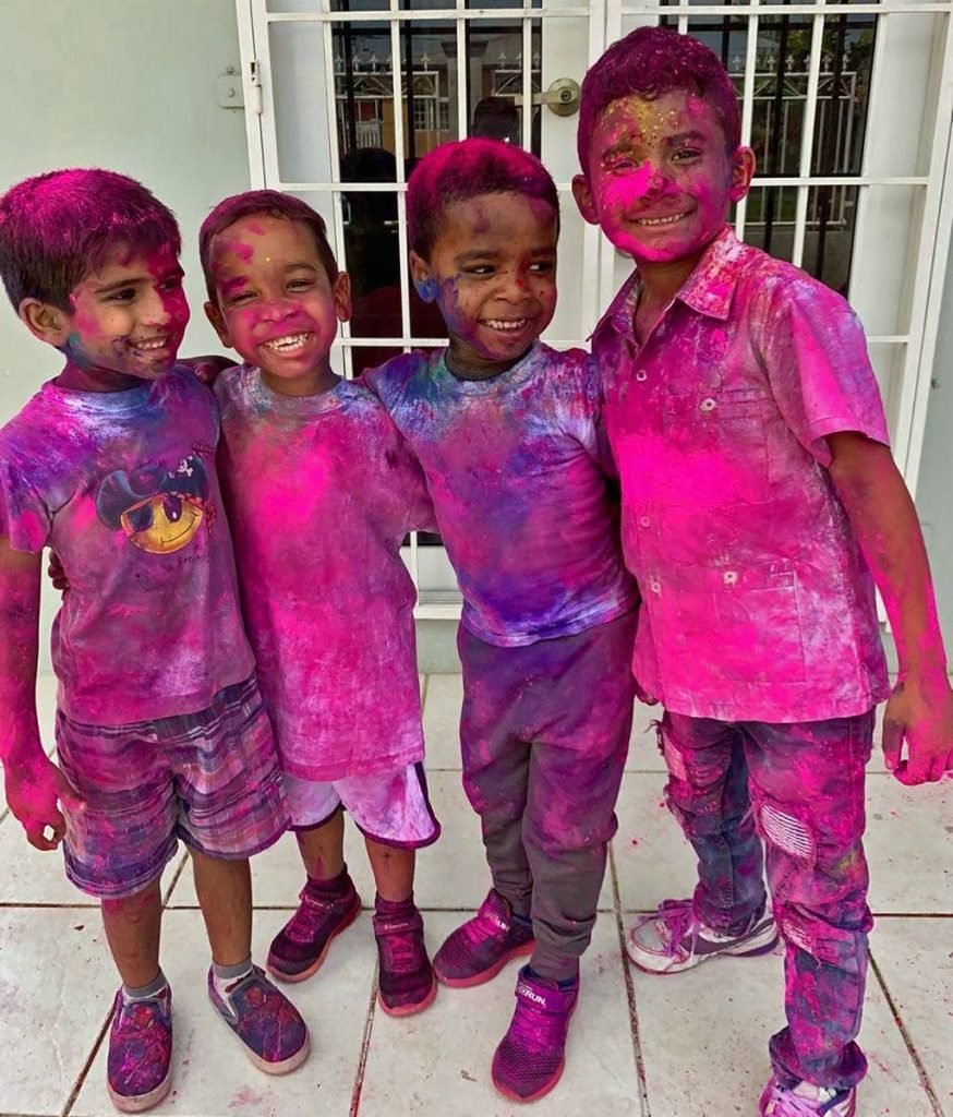 These boys enjoy themselves at Little Angels Paradise Nursery and Kindergarten’s Phagwa celebrations.
 - 