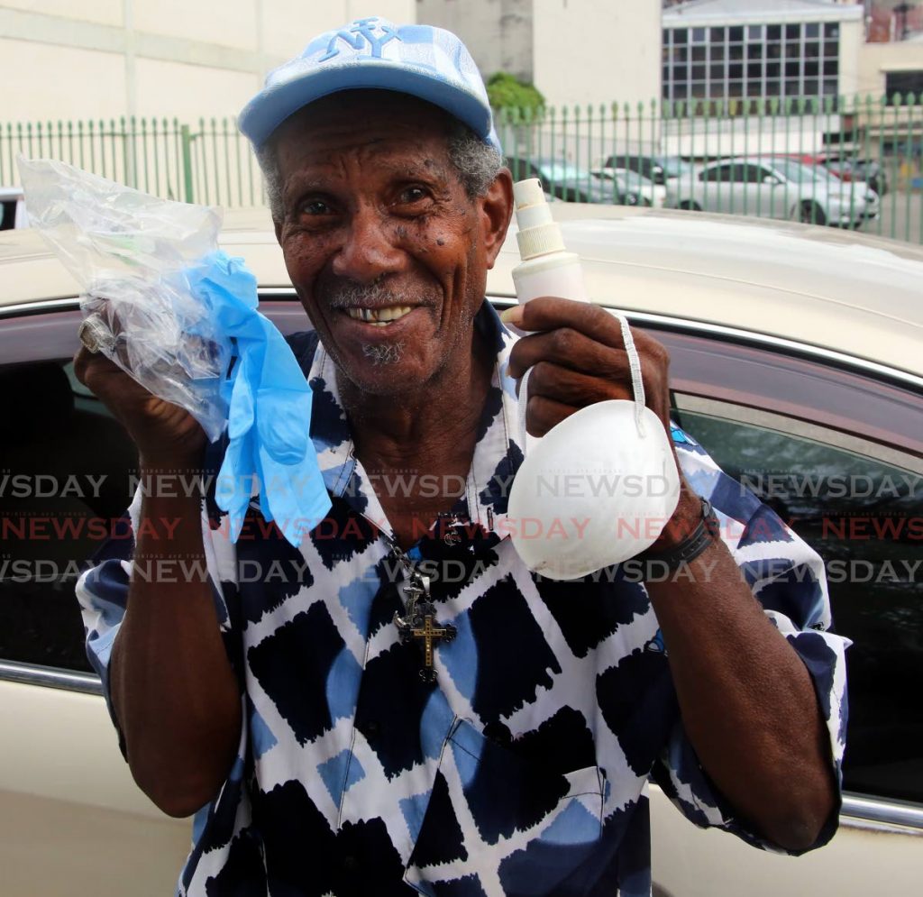 Errol Alexander president of the St James Taxi Drivers Association is urging all taxi drivers to arm themselves with gloves, masks and a bottle of santizer as they go about their daily work, especially since they are touching money. - SUREASH CHOLAI