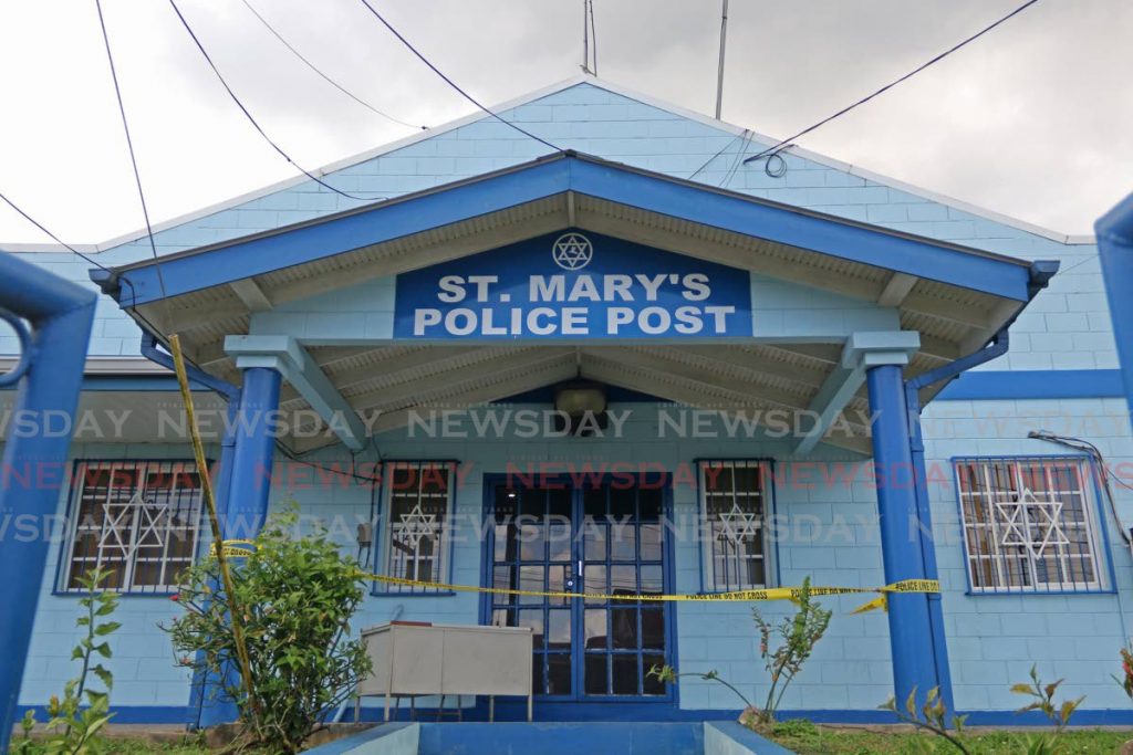 Caution tape has been placed barring access to the front door of the St Mary's police post. - Marvin Hamilton