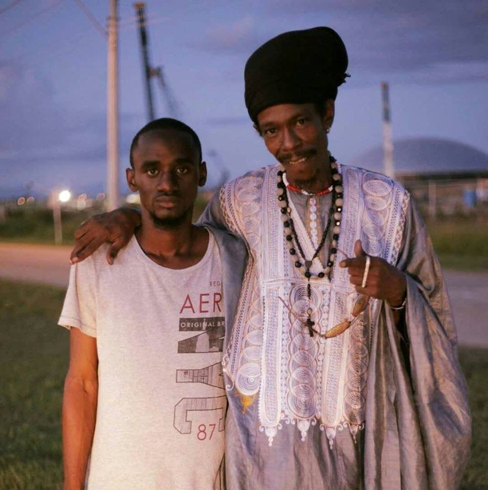 Ezekiel Clarke (right) and his son Akeem who was shot dead on Tuesday night. - 