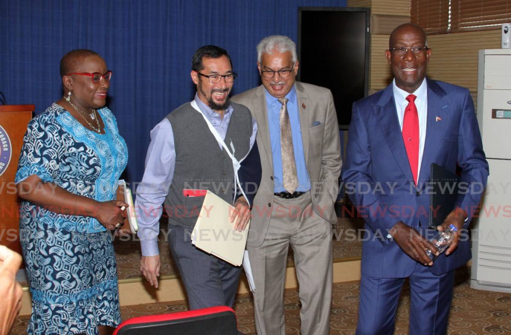 Minister of Social Development and Family Services Camille Robinson-Regis, Minister of National Security Stuart Young, Minister of Health Terrence Deyalsingh and Prime Minister Dr Keith Rowley, have a laugh after a post-cabinet media briefing at the Diplomatic Centre, St Ann's, on Monday. - ANGELO MARCELLE