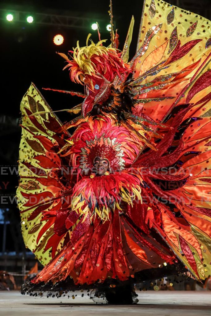 Junior Queen of Carnival Aniya Sealey portrays Phoenix Rising From The Ashes at the Carnival Lagniappe 2020 A Night with the Champs, Queen's Park Savannah, Port of Spain, on February 29. Minister of Culture Nyan Gadsby-Dolly says Carnival 2021 will not be the same as this year's owing to changes caused by the covid19 global pandemic. - JEFF K MAYERS