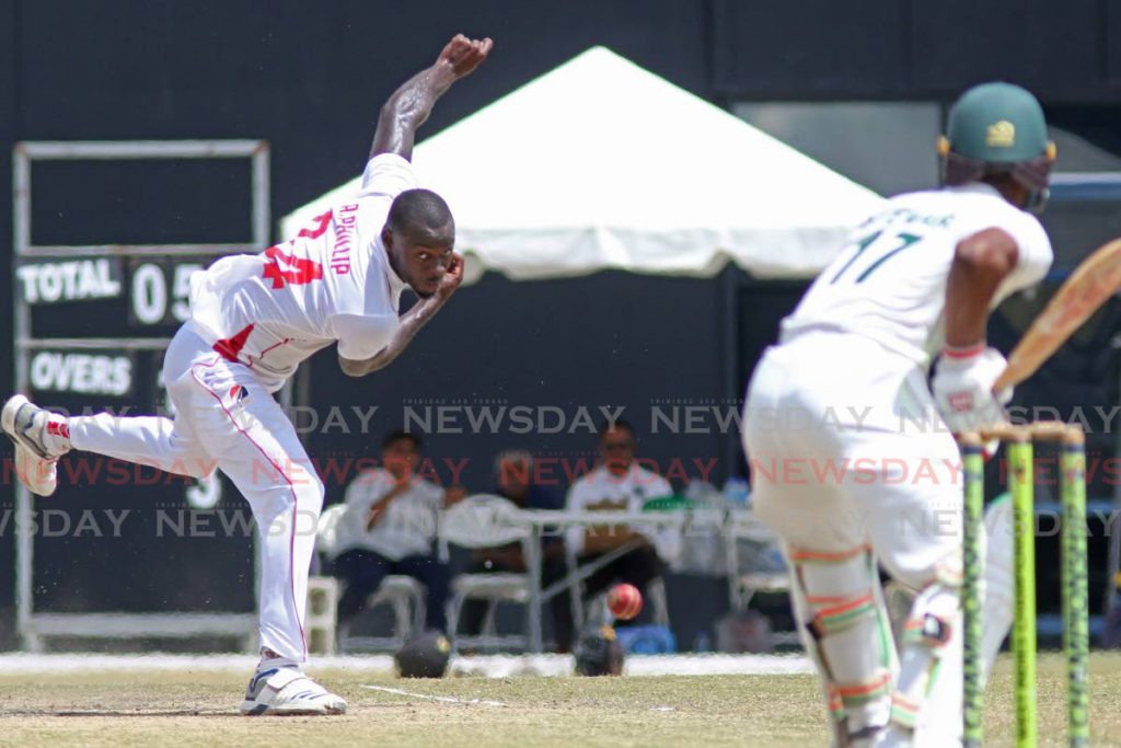 In this March 14 file photo, TT Red Force fast bowler Anderson Phillip plays a ball against Emmanuel Stewart of Windward Islands Volcanoes on the final day of the West Indies Four-Day Championships clash at the Brian Lara Stadium, Tarouba. - Marvin Hamilton