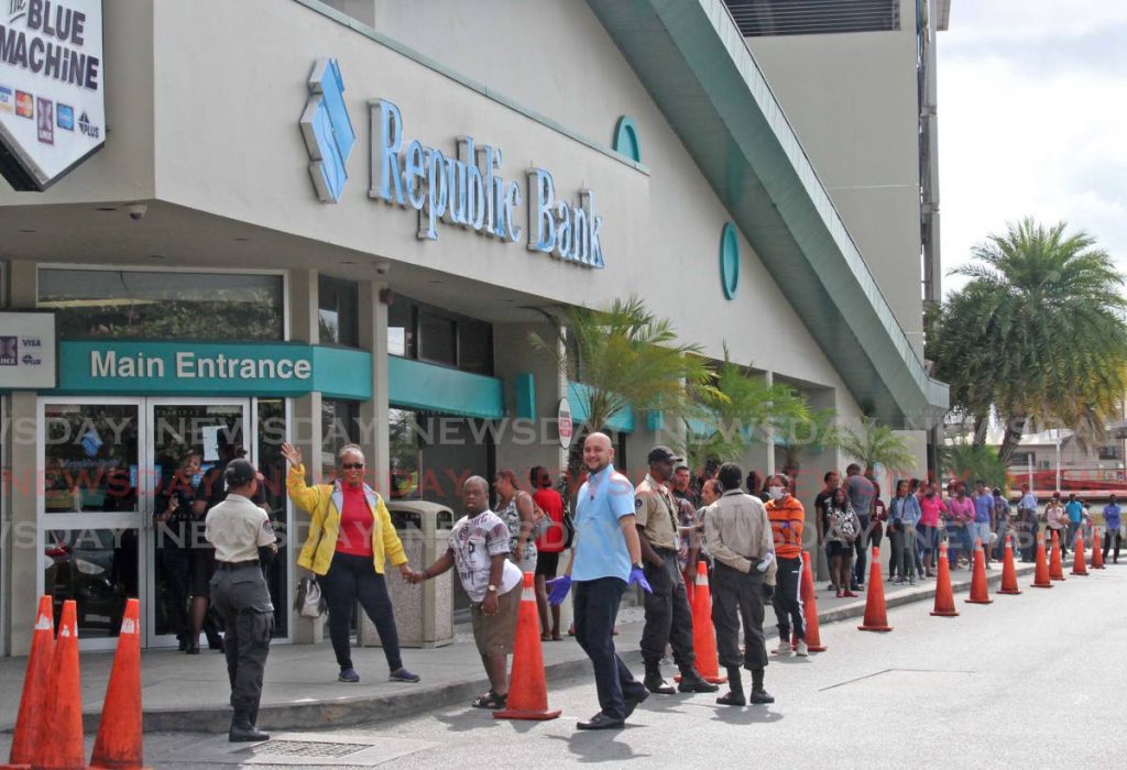 Customers outside Republic Bank’s Chaguanas branch on Thursday.  - Vashti Singh