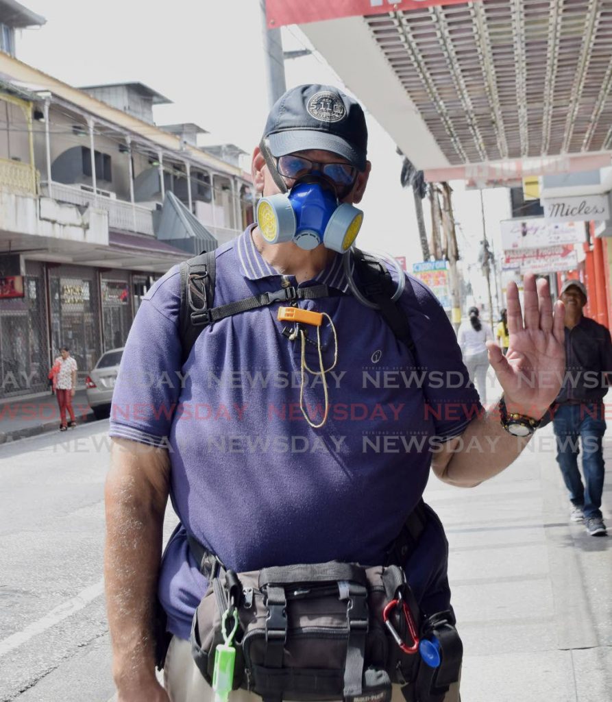 A man wears a complex face mask on Frederick Street in Port of Spain on Monday. - Vidya Thurab