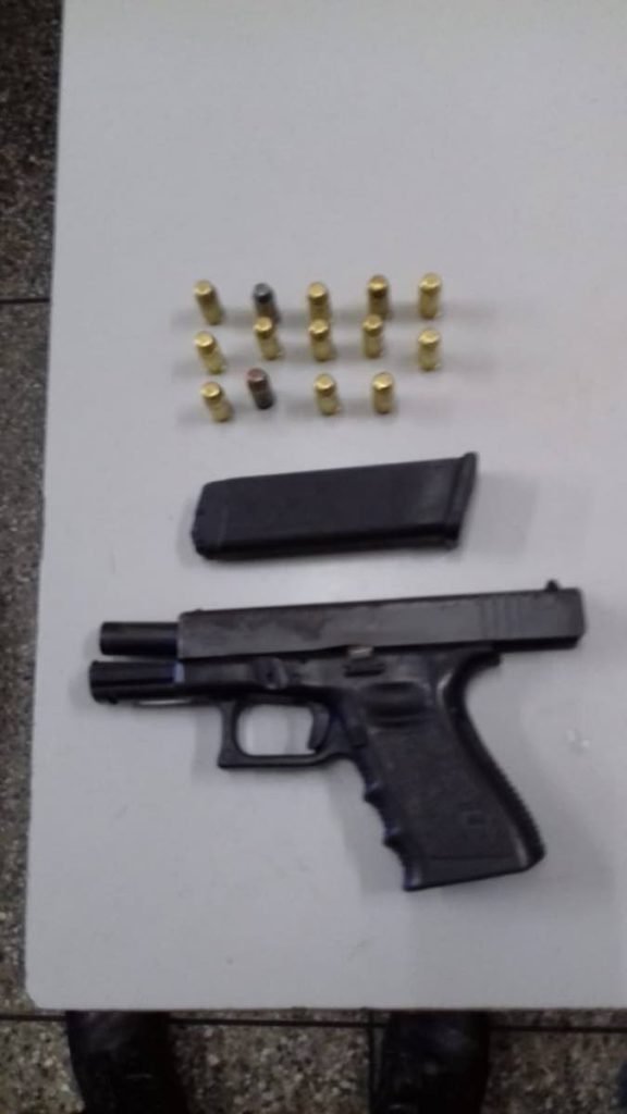 A Glock pistol and 14 rounds of ammunition were siezed by members of the Port of Spain Task Force during an exercise in Laventille on Wednesday. 

PHOTO COURTESY TTPS - TTPS