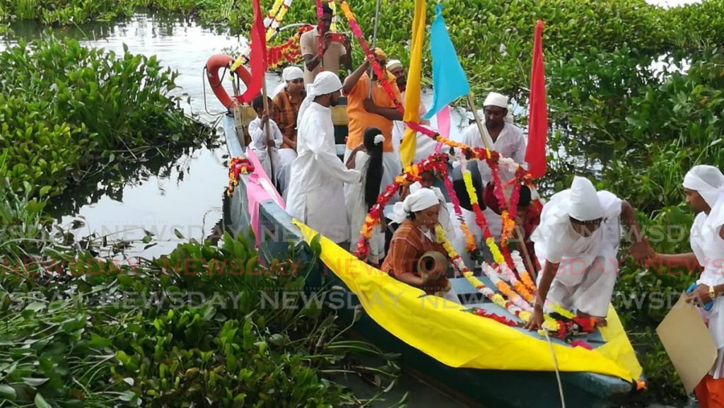 In this May 26, 2019 file photo, the Cedar Hill Organising Committee re-enact the arrival of East Indians during Indian Arrival Day celebrations at Usine Ste Madeleine Pond. This year, marks the 175th anniversary of the first sailing from India to Trinidad. - 