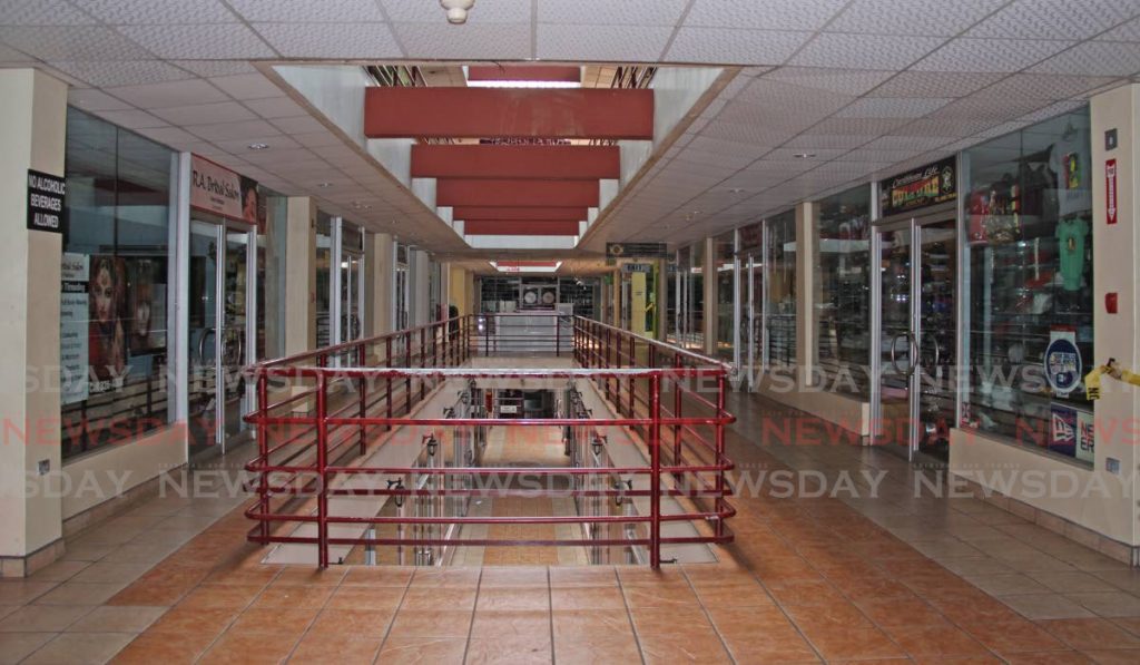 Stores remain shut at RRM Shopping Mall on High Street, San Fernando on April 24 due to covid19 restrictions. Business chambers hope the retail sector can reopen before June 7. PHOTO BY VASHTI SINGH - 