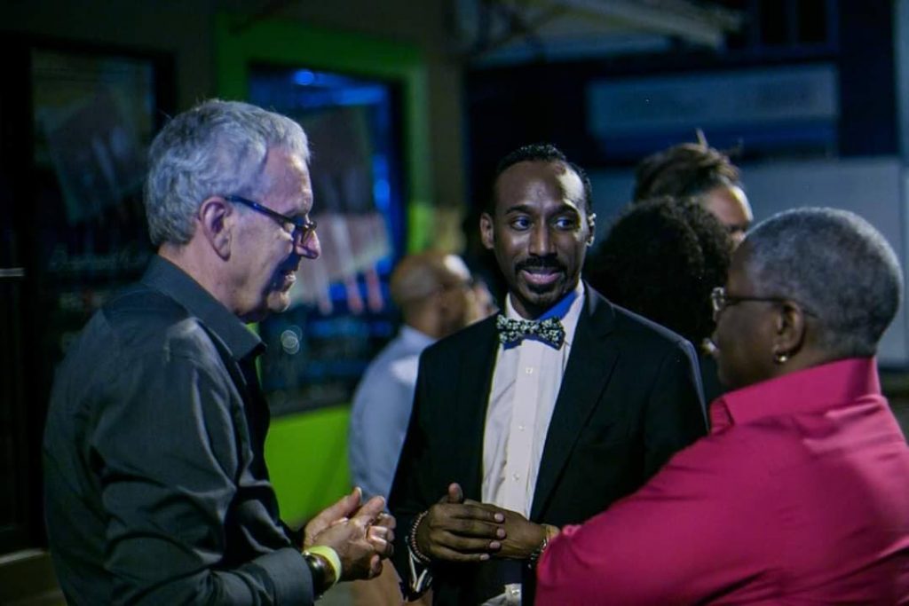 Nolan Frederick, centre, with founder and festival director of the TT Film Festival Bruce Paddington and journalist Franka Philip at the premiere of the TT Film Festival in 2015. - Photo courtesy TT Film Festival