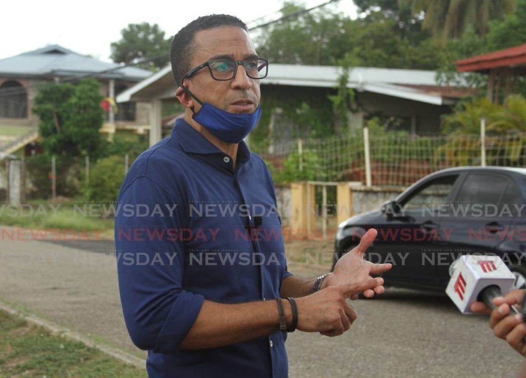 Former TT midfielder David Nakhid speaks to the media before distributing hampers in his hometown of Mt D'or, Champs Fleurs. PHOTO BY AYANNA KINSALE. - Ayanna Kinsale