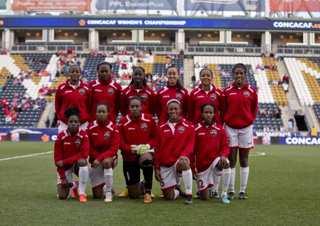 TT’s women’s team pose for a team picture prior to the game against Costa Rica in the 2014 Concacaf Women’s Championship semifinal game on October 24, 2014 at
 PPL Park in Chester, Pennsylvania.  
(AFP PHOTO) - Mitchell Leff